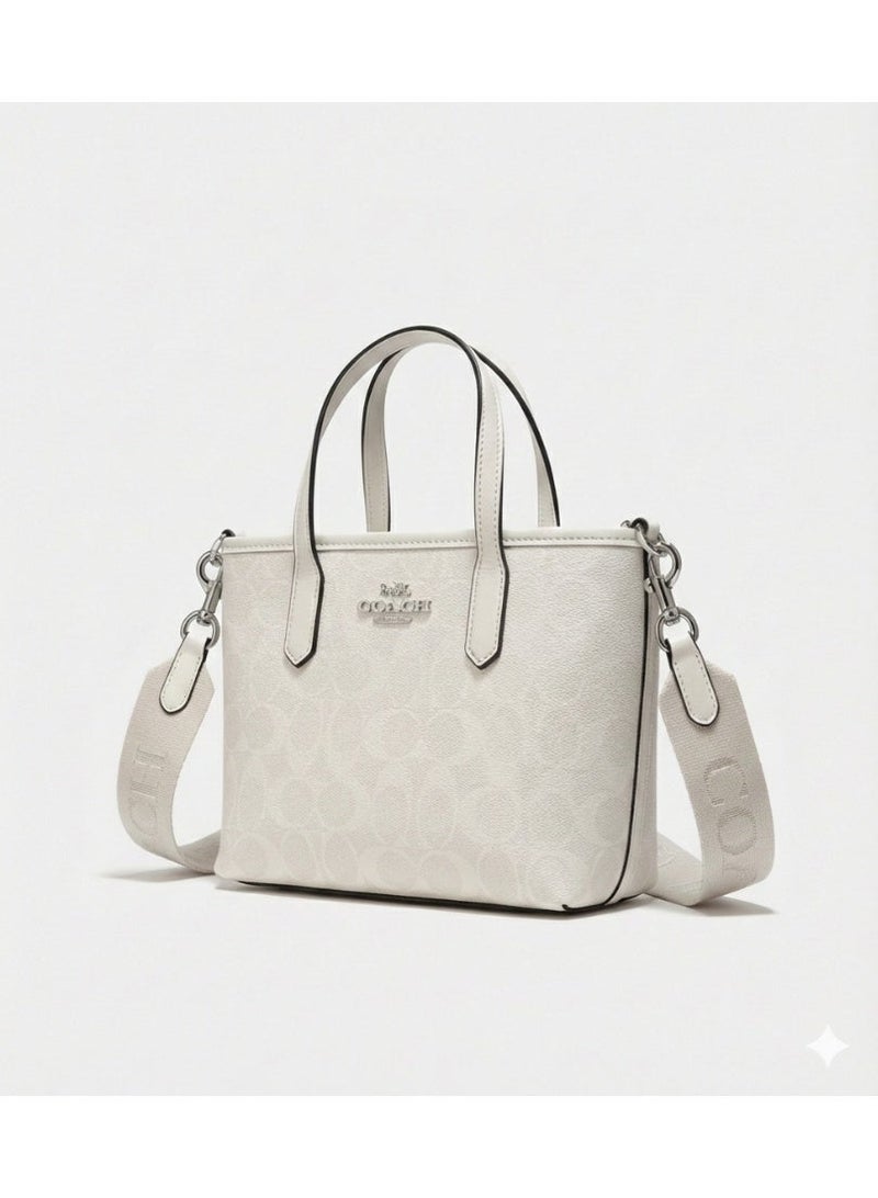 coachoutlet Coach City Mini Tote Bag in Signature Canvas - White - Image 1